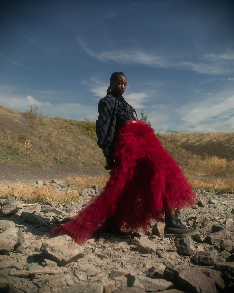 Red tulle skirt blowing in the wind