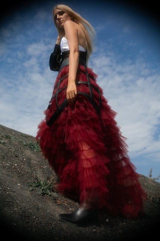 Low angle shot of a voluminous red tulle skirt