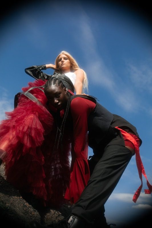 Two models moving through the wind