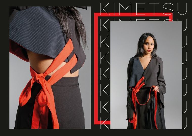 Detail of red ribbon ties on a black jacket