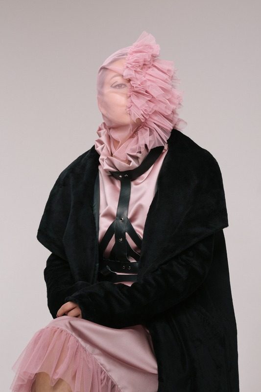 Tulle mask with long black coat